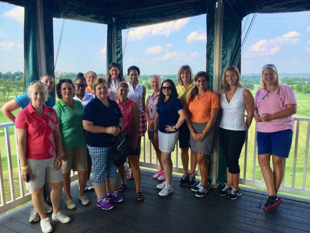 group golfing at Gathering on the Greens